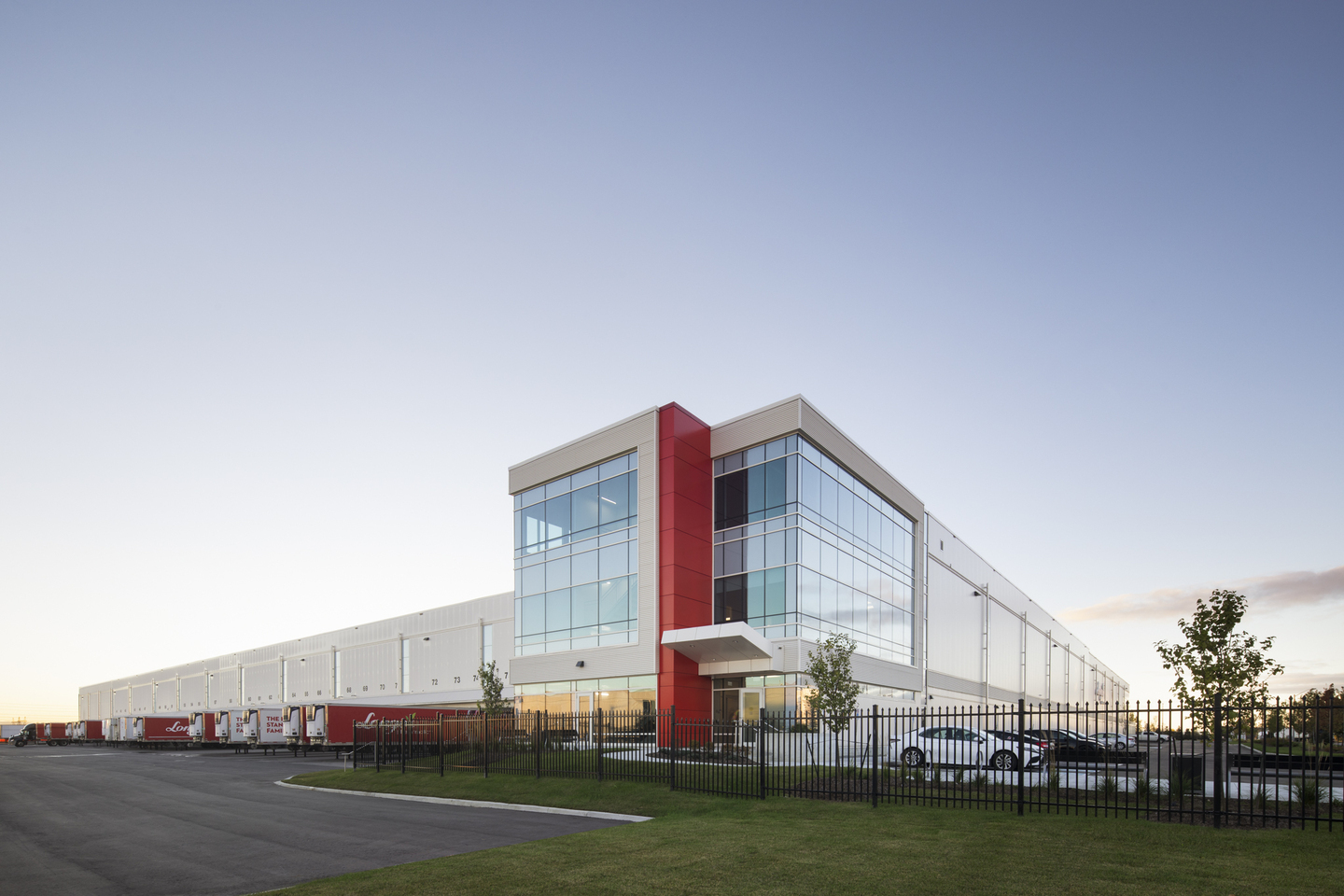Corner view of back facade with new office spaces and loading docks