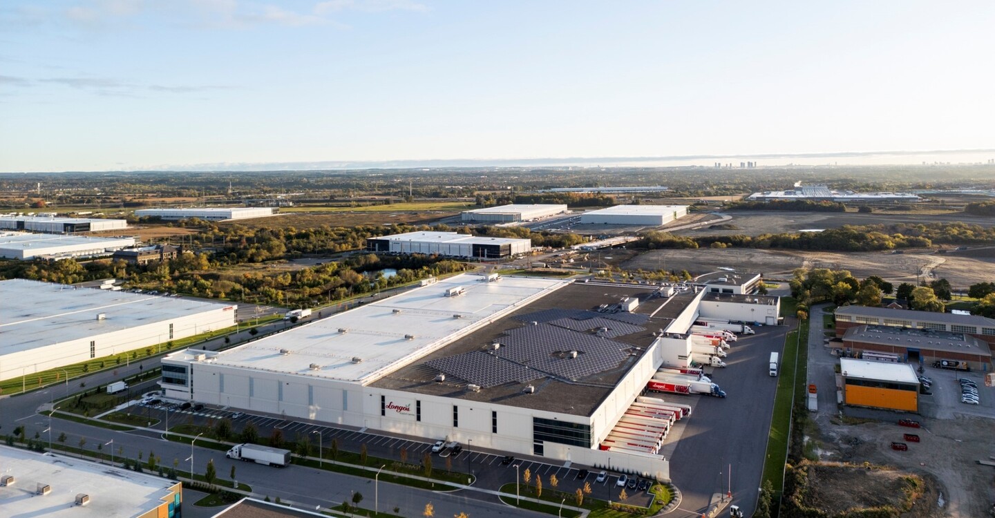 Aerial view showing original and expanded sections of the building