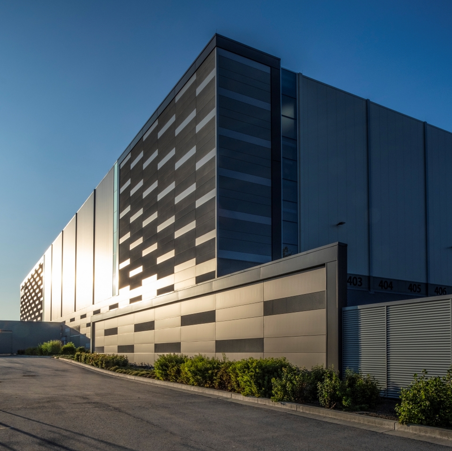 Detail of front facade, showing dynamic interplay of geometric pattern