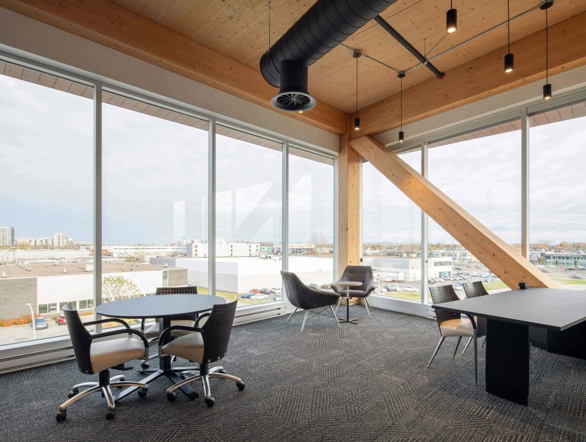 Interior view of the Code440 building’s offices featuring an exposed timber structure